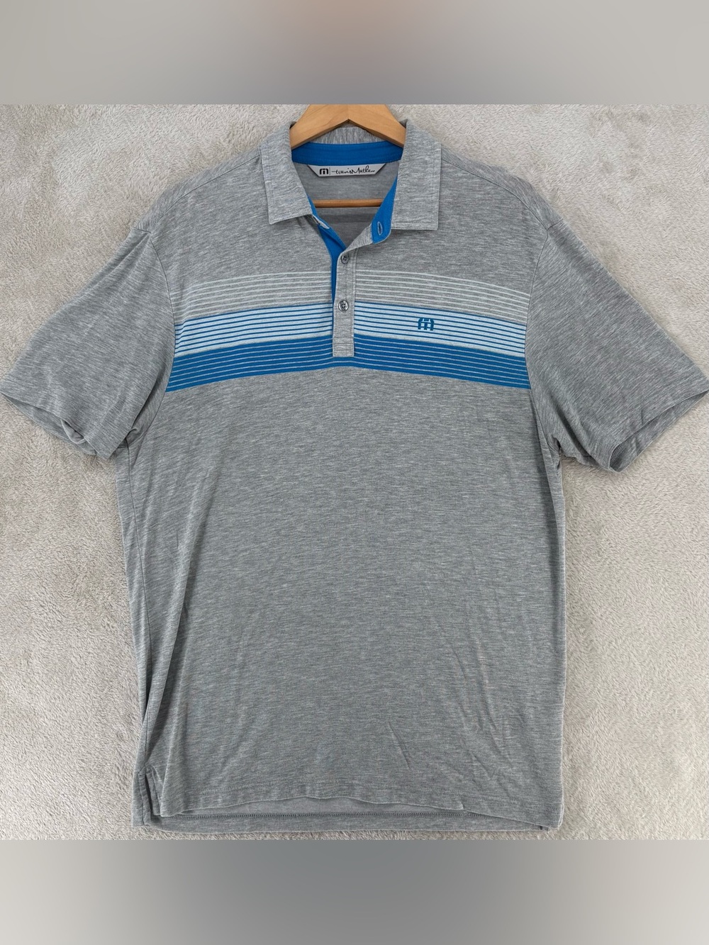 TravisMathew Gray Polo with Blue Stripe Chest
